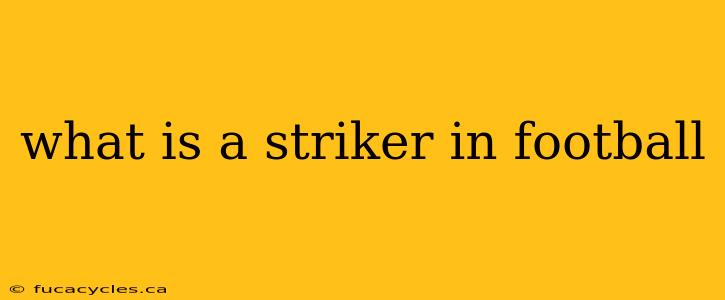 what is a striker in football